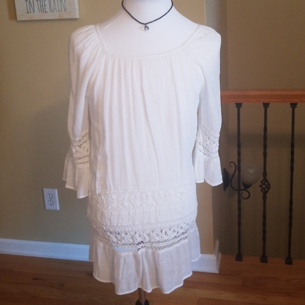 Off white dress or a top whichever  you prefer
